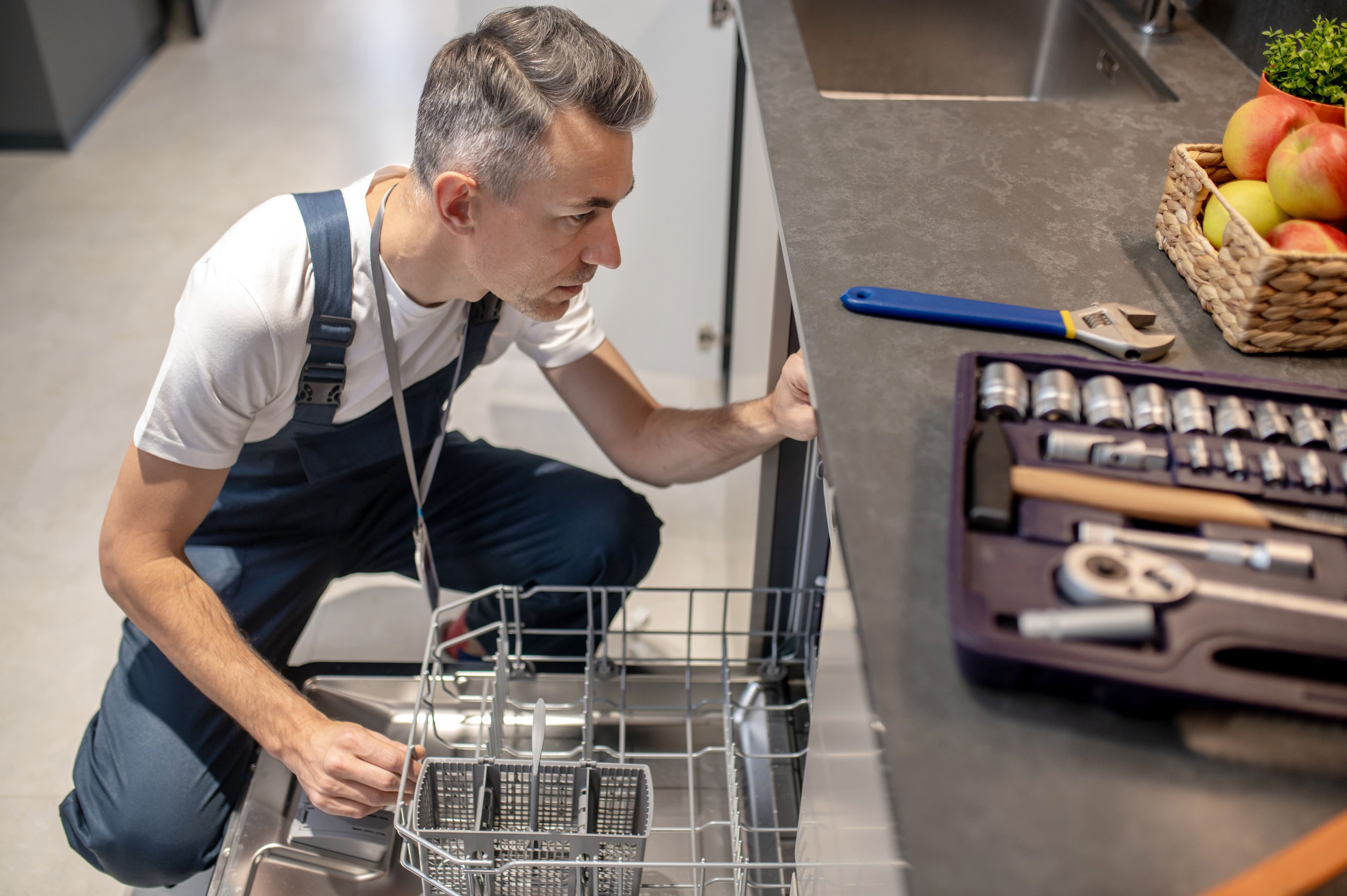 Access the Dishwasher's Discharge Fitting